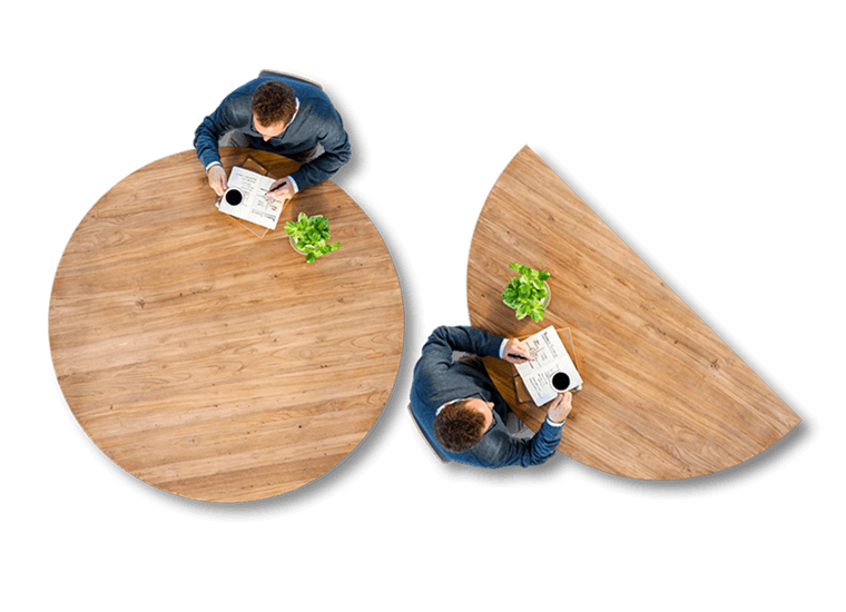 Wooden tables with laptops